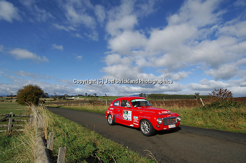 The bright red Volvo of the Batten's looks great in the country side