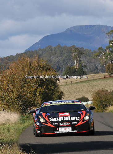 Kevin Weeks in his Lamborghini with the mountains as a back drop