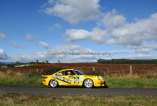 Rex Broadbent passes past paddocks in the area